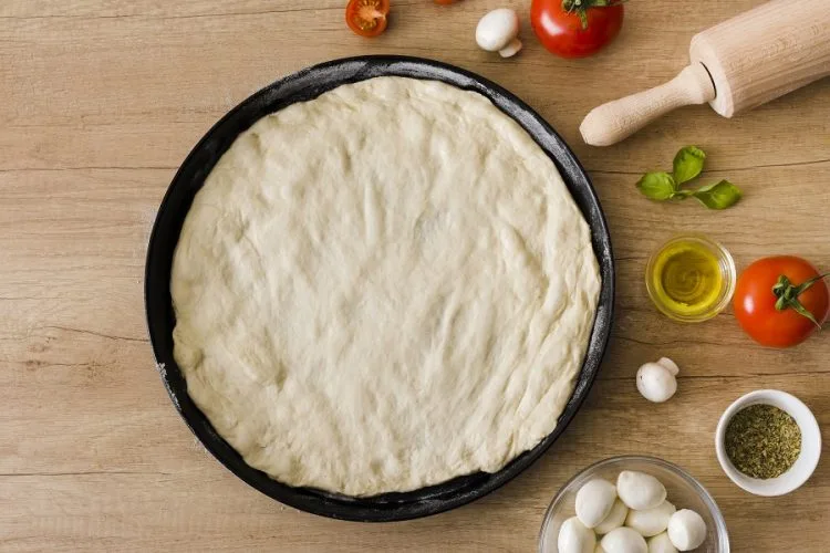 Pâte à pizza épaisse et moelleuse - Volupta cuisine Pâte à pizza épaisse by Freepik